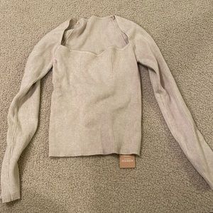 beige sweater